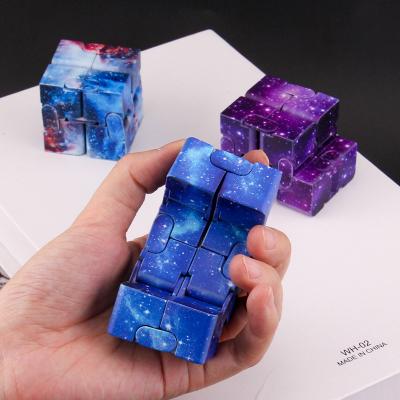 China Colorful Magic Cube Toy Anti Stress Galaxy Cube Hand Finger Plastic Portable Finger Toy Stress Reliever Decompression Hand for sale