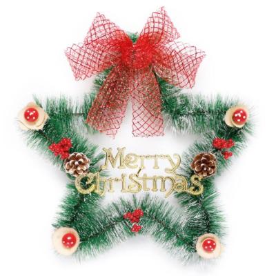 China Eco-friendly Star Shape Artificial Christmas Wreath With Flower Berries Ribbon Pine Needles Xmax Wreath Outdoor Decoration for sale