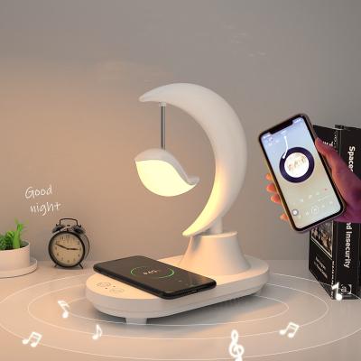 China Modern Living Room Lamps Bedrooms Magic Moving Night Light Wireless Charging 7 Color Adjustable Music Player Night Lights for sale