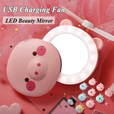 China Plastic Mini Fan With Mirror LED Light Up Hand Fan Beauty Mirror Cartoon Pig Multifunctional USB Rechargeable Cooling Outdoor Fan Small for sale