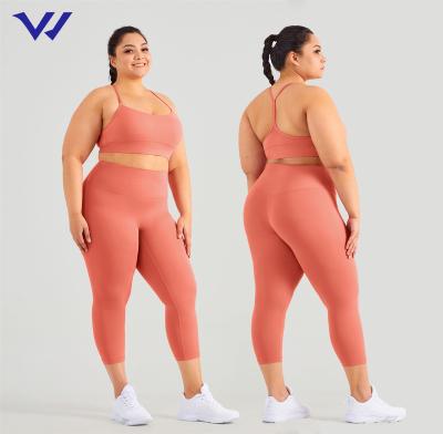 China Breathable Gym Fitness Yoga Suits 2022 New Women Plus Size Yoga To Wear Sexy High Waist Leggings Bra Strap Solid Yoga Sets for sale