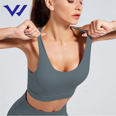 China High quality breathable shockproof wholesale custom logo sports bra for women summer style cut out sports yoga bra plus size for sale