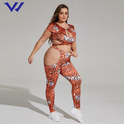 China New sexier breathable waist yoga clothes printing hollow fashion fitness clothes sports two-piece yoga suit for sale