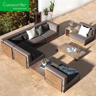 China Conjunto de sofá de jardim de madeira de teca Mobiliário de design moderno seccional Mesa de café e sofá de jardim ao ar livre à venda