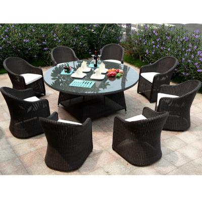 China Conjunto de comedor de ratan de vidrio al aire libre Muebles para jardín de patio Conjunto de mesa y silla de comedor en venta