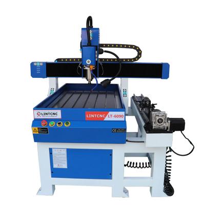 China High Quality Hotels CNC 6090 Machine With Water Dipped For Metal Wood Marble Aluminum Plastic Panel for sale