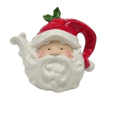 China Viable creative ceramic Christmas Santa head coffee pot teapot from dolomite/earth pottery for sale for 2021 for sale