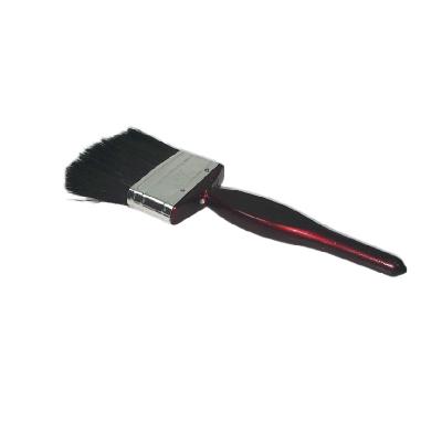 China Two Inch Black Bristle Nylon Paint Brush With Red Slime Plastic Handle for sale