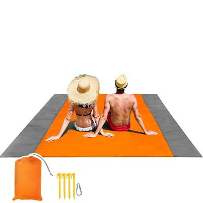 China Waterproof Foldable Beach Mat Sand Proof Picnic Blanket Lightweight Portable Oversized Durable for 4-7 Adults for Summer Camp Hiking for sale