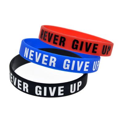 China Custom Cheap Promotional Rubber Silicone Round Europe Charity Bracelet Wristband Plain Debossed for sale