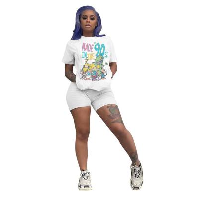 China Latest QUICK DRY Ladies Casual Loose Elastic Two Piece Shorts Set Colorful Cartoon Printed Short Sleeve Top Women 2 Piece Suits for sale