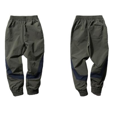 China Kids Breathable Cargo Jogging Rise Playing Outdoor Pants Waterproof Sports Tactical Casual Pants for sale