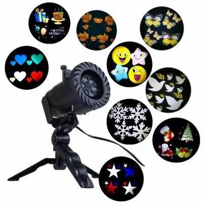 China 3-18 Festival Themes Customized 13 Themes LED Christmas Snowflake Projector Portable Laser Light Projector Birthday Halloween Wedding for sale