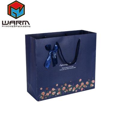 China paper & Luxury Boutique Customized Cardboard Gray Print Paper Shopping Gift Bags With Ribbon Handles for sale