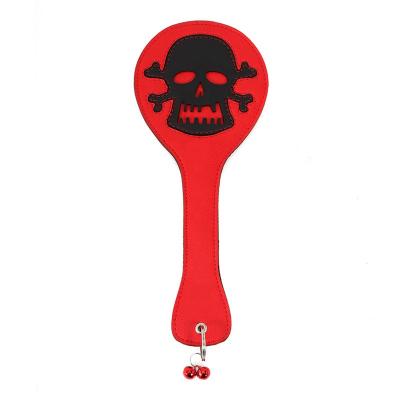 China PU Leather Red Grip Leather Whip Bondage Skull Pattern PU Restraint Fetish Slapper Paddles Skull Pattern for sale