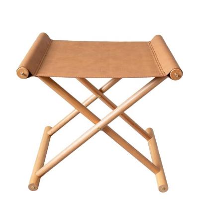 China Adjustable (other) Wholesale Soft Leather Solid Beech Wood Multipurpose Foldable Portable Freestanding Foot Stool for sale