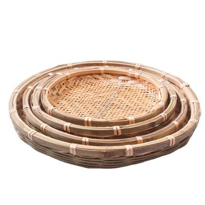 China China Sustainable Supplier Different Design Large Round Flat Vintage Bamboo Weaving Basket Handmade for sale