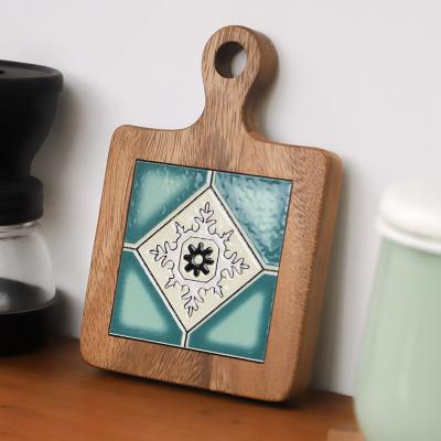 China Acacia Wood Stocked Rug Finial Brick Pot Holder Coasters and Desk Pads Kitchen Table Pads for sale