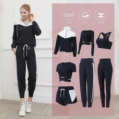 China 2021 Breathable Hot Selling 7 Piece Women Sport Workout Yoga Fitness Wear Clothing Set for sale