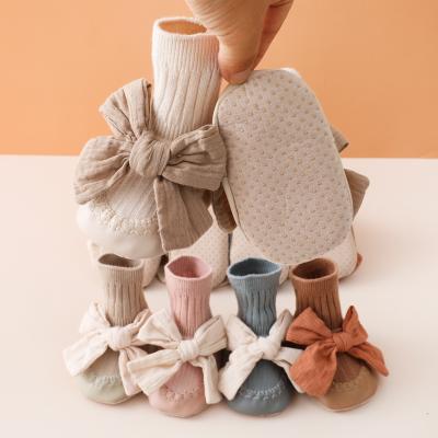 China INS Cotton Baby Shoes Socks Solid Color Bow Knot Anti-skid Combed Anti-skid Baby Tube Socks for sale