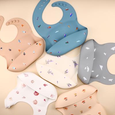 China Silicone Bib Printed Pattern Silicone Washable Customized Baby Bibs Waterproof Baby Silicone Feeding Bibs for sale