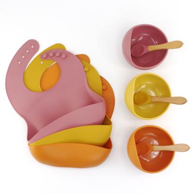 China Dropshipping Daily Life Silicone Baby Bowl Feeding Spoon Set Waterproof Non-slip Silicone Tableware Children Bowl With Bibs for sale