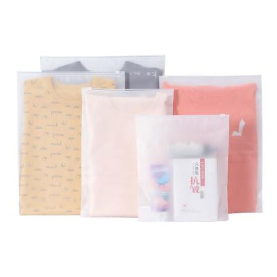 China Security Customized Frosted Logo PVC Apparel Packaging Packaging Zipper Plastic Bag For Swimwear Garment Zipper Lock Cosmetic Pouch for sale