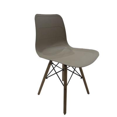 China Cheap Decorative Modern Design Plastic Armless pp Shell Cafe Side Dining Chair Wholesale High Quality Modern New With Wooden Legs for sale