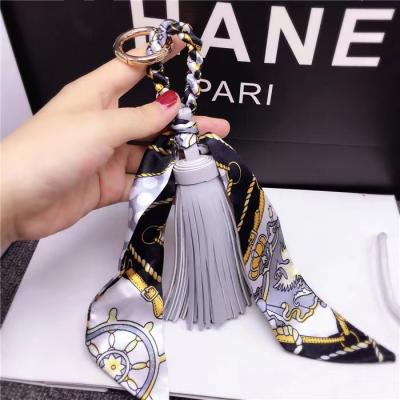 China Scarf Leather Silk Bag Promotion Gift PU Tassel Accessories Pendant Keychain for sale