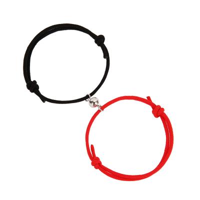 China FASHIONABLE Fashion Adjustable Black Red White Mutual Attraction Bracelet Couple Magnetic Bracelet for sale