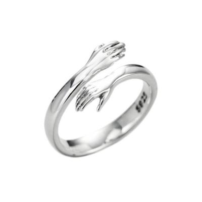 China TRENDY Couple Ring Adjustable Opend Hand Embrace Two Ring s925 Sterling Silver Ring for sale