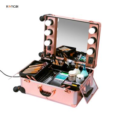 China Universal Professional Led Lighted Makeup Case Beauty Trolley Cosmetic Train Case KC-IST01 Rose Gold for sale