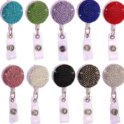 China Retractable Plastic Name Badge Holder Clip Badge Holder With Round Shape Nurse Rhinestone ID Card Badge Attendance Reel For DIY for sale