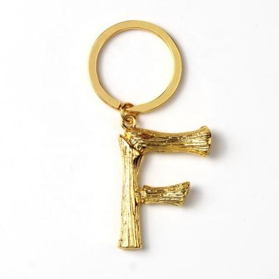 China Lead& fashion nickel free letter shape wooden alloy key chain for promotional gift key chain for pendant ornaments for sale