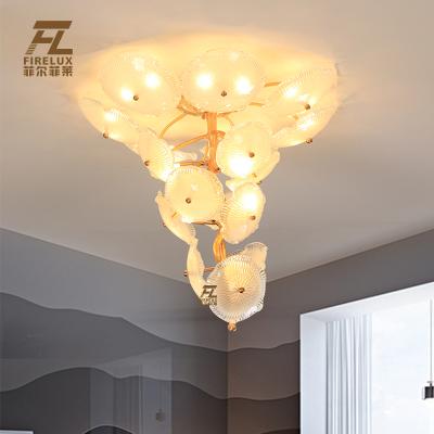 China Contemporary Post Modern Luxurious Modern Staircase Brass Glass Height Art Lotus Villa Pendant Ceiling Lamp for sale