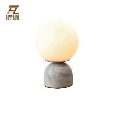 China European Modern Minimalist Bedroom Magic Glass Lampshade Modern Decorative Nordic Copper Bean Designer Mail Style Table Lamp for sale