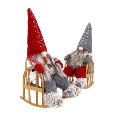 China Nonwoven Textiles Santa Rocking Chair Man Plastic Minions Ornament Minions Jurassic Christmas Pyroar Plush Ornament Jurassic Santa Claus for sale