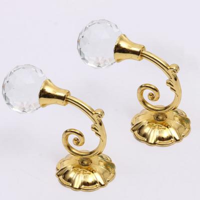 China Factory Directly Good Selling Viable Crystal Gold Polished Clear Glass Hanger Clothes Hook Garment Hook Hanger for sale