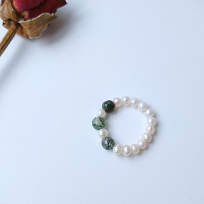 China DIY Fashional pearl the natural freshwater pearl Ring Green Water Grass Stone Ring Elastic Pearl Ring handmade beaded for sale