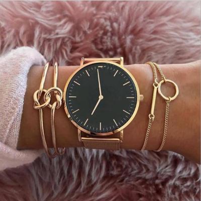 China Fashion Gold Environmental Friendly Korean Bangles Set Jewelry Women Gold Plated Knot Cuff Bracelet for sale