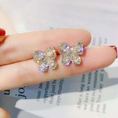 China Cute Tiny Butterfly Stud Earrings Korea Rhinestone Diamond Butterfly Stud Earrings Women Nickel Free for sale