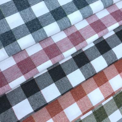 China Anti Pill Customized New In Stock Lot Good Quality Cotton Polyester Flannel Tartan Plaid Uniform Fabric for sale