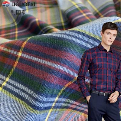 China Custom Classic Yarn Dyed Twill Shirting Canvas Fabric Breathable Business Casual Dress Brush 100 Cotton Flannel Check for sale