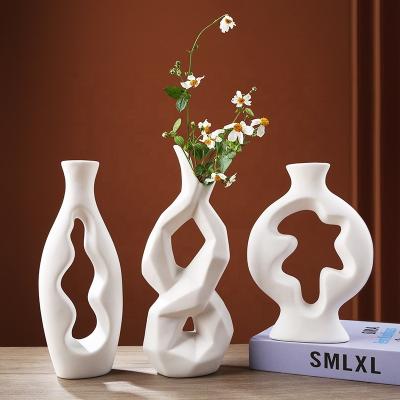 China Simple Elegant Polished Creative Modern White Ceramic Vase White Ceramic Flower Vase For Dry Flowers Fresh Flower Home Decoration for sale