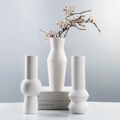 China Creative Minimalist Simple White Ceramic Artistic European Style Dry Flower Ornament Porcelain Vase Living Room Decoration Vase for sale