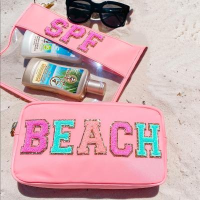 China Custom RTS Waterproof Stock Glitter Nylon Waterproof College Patches Custom Travel Beach Bridesmaid Birthday Gifts Small Makeup Bag for sale