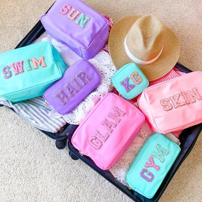 China RTS New Glitter Durable Running Nylon Portable Personalized Letter Patches Travel Custom Toiletry Lady DIY Women Makeup Brush Cosmetic Bag for sale