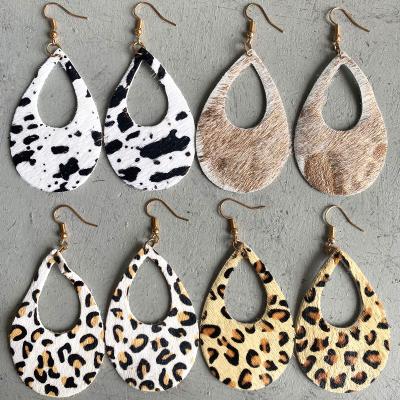 China CLASSIC Bohemian Leopard Print Vintage Leather Earrings Women Fashion Handmade Genuine Fur Leather Drop Shaped Hollow Out Earrings for sale