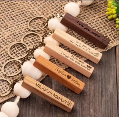 China Wood Personalized Key Chain Pendant For Couples Unique Gifts Customized Monogram Engraved Letters Beech Wood Band Rectangular Key Ring for sale