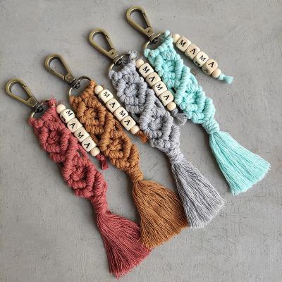 China Matching MOM bead key chain fashion letter pendant cotton bohemian keychain cotton tassel thread handwoven ethnic wooden custom macrame for sale